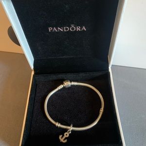 Pandora charm bracelet w/ charm.  NEW WITH BOX